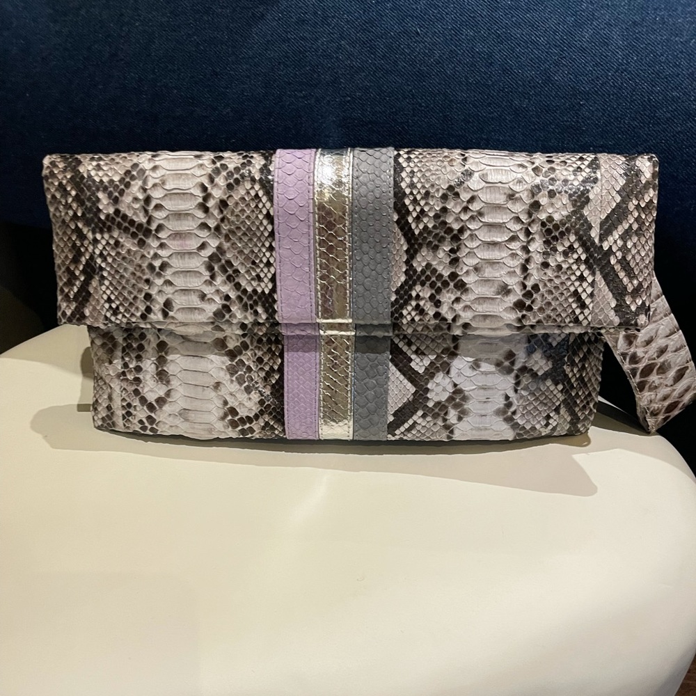 Snakeskin clutch made in Italy never been used